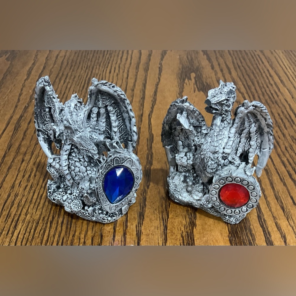 Matching silver dragons with blue and red jewels
